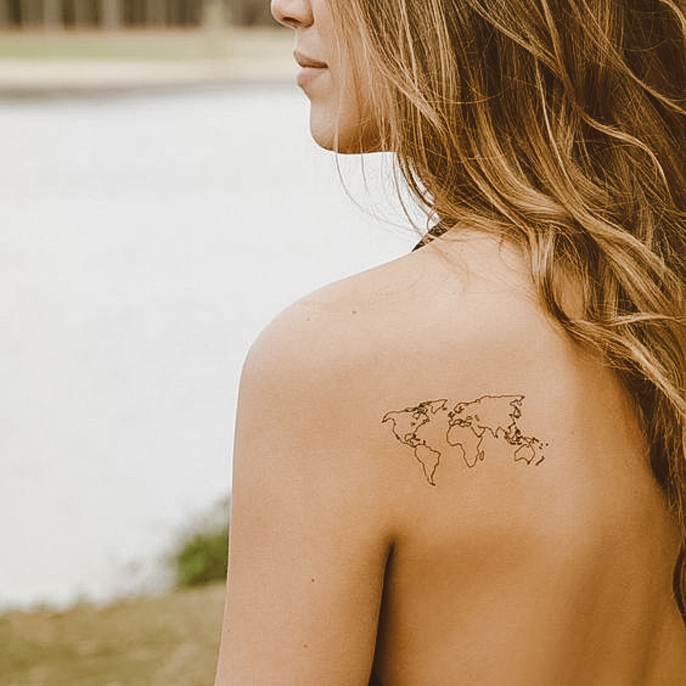 tatuagem viagem costas