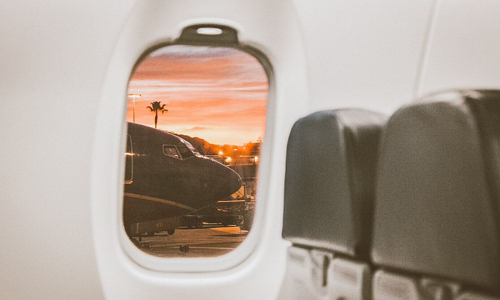 seguro viagem itália janela avião